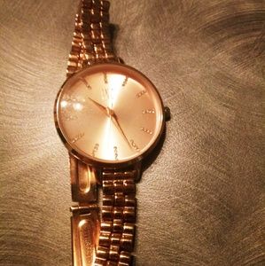 Inc concept rose gold watch